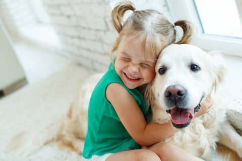 Adopted child with dog